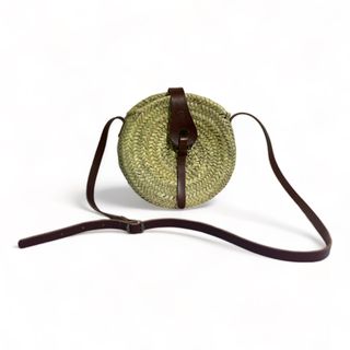 Bolso bandolera redondo trenzado para mujer palma