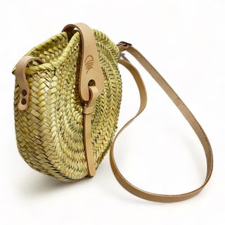 Bolso bandolera redondo trenzado para mujer palma