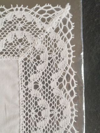 Paño blanco con encaje