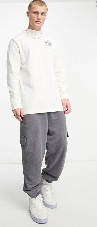 Camiseta Nike Manga Larga Cuello Alto Blanco Vela.