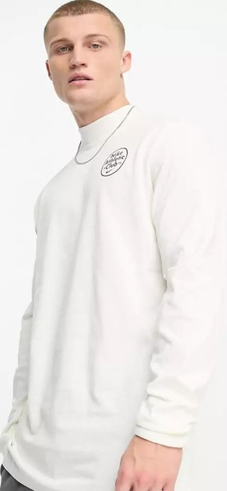 Camiseta Nike Manga Larga Cuello Alto Blanco Vela.