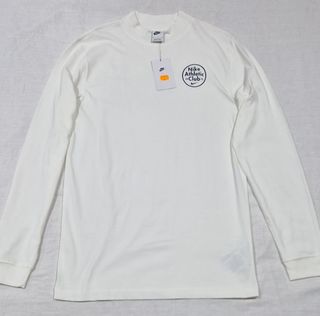 Camiseta Nike Manga Larga Cuello Alto Blanco Vela.