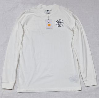 Camiseta Nike Manga Larga Cuello Alto Blanco Vela.