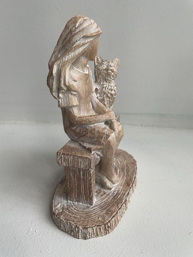 Figura di un giovane uomo con un gatto