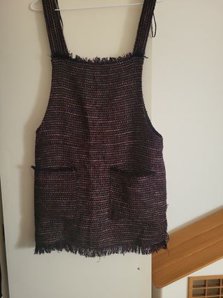 Peto de falda corto negro con brillos talla M