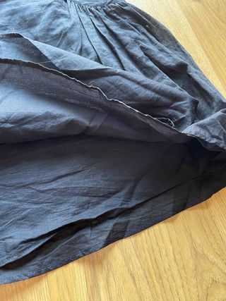 Falda negra plisada acampanada cinturon T.36