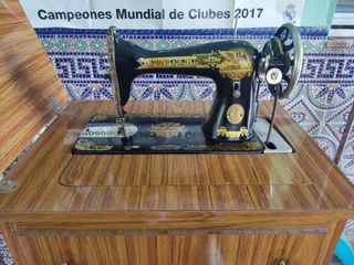 Maquina de coser singer