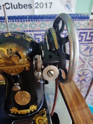 Maquina de coser singer