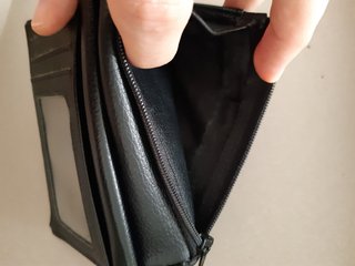 Cartera negra cuero hombre