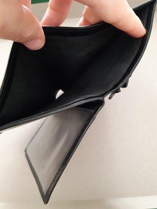 Cartera negra cuero hombre