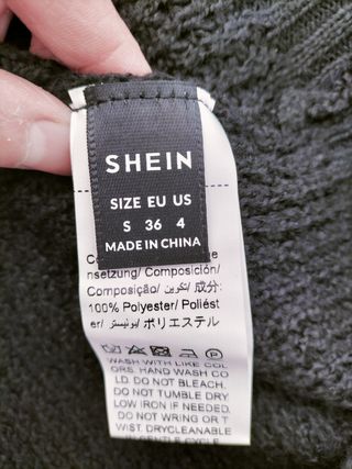 Nuevo. Jersey largo negro punto calado. Shein