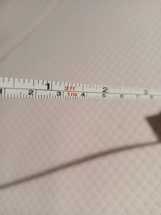 Bascula portatil pesar equipaje + cinta métrica.