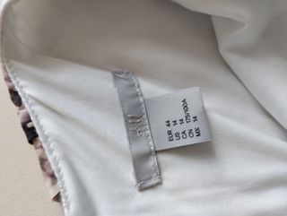 Abito smanicato svasato floreale 44