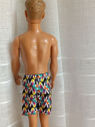 Barbie FJF09- Beach con Costume Stampato Colorato