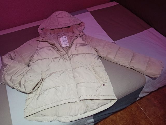 Plumas beige de Springfield