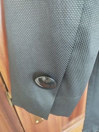 Chaqueta negra con cinturón Talla 46