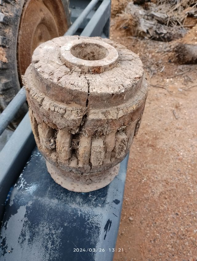 Antigua masa de rueda de carro