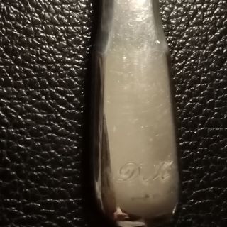 Apribottiglie in argento vintage. 