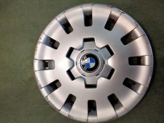 Juego tapacubos BMW.