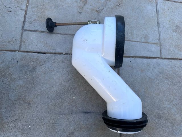 Manguito WC acodado 21cm pared 110mm