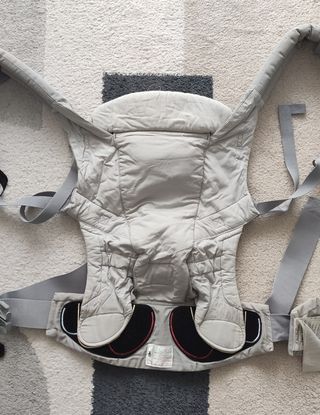 Mochila portabebé con funda lluvia