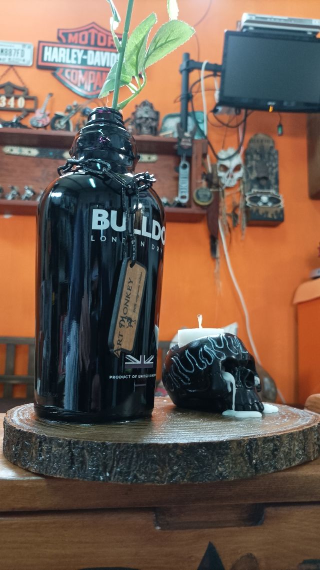 Bottiglia porta fiore con candela