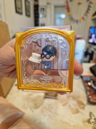 Figura con caja momentos de Harry Potter