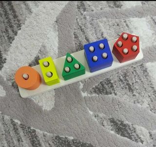 Gioco in legno ,sistema Montessori