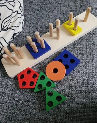 Gioco in legno ,sistema Montessori
