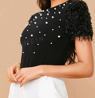 blusa elegante con perlas