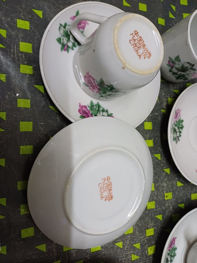 5 tazas de café chinas con platos