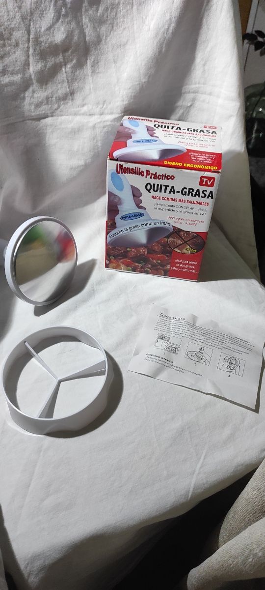 Practico utensilio QUITAGRSA a estrenar 