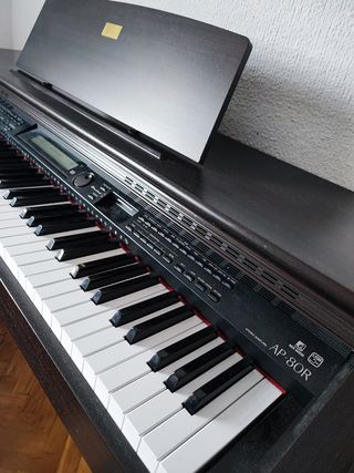 Piano de pared/ Casio
