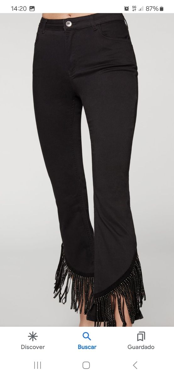 Pantalon negro con flecos brillantes