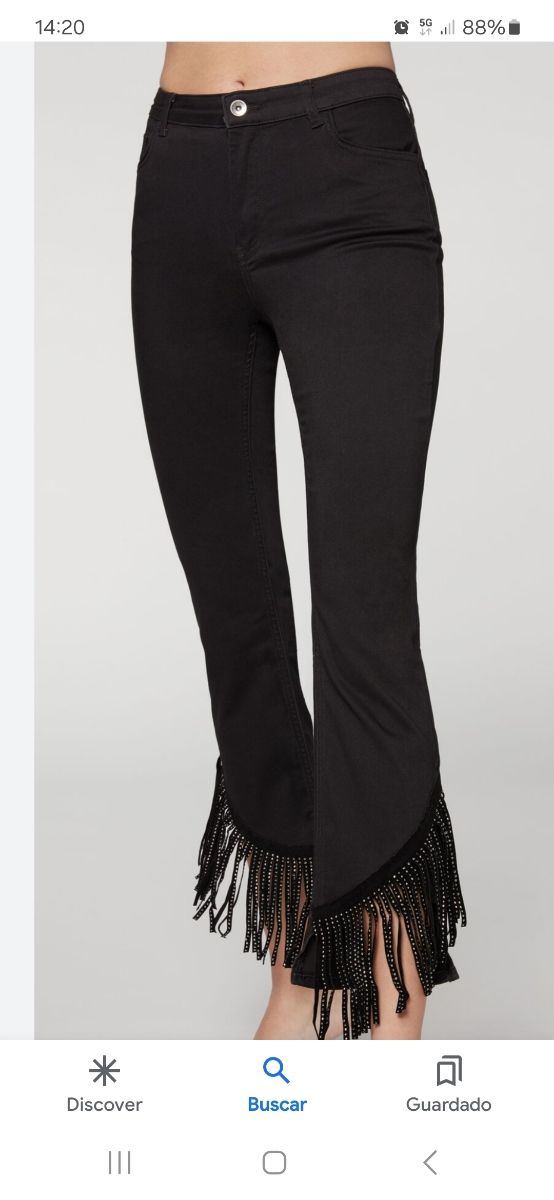 Pantalon negro con flecos brillantes