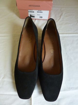 Zapatos de vestir, utilizados durante media hora  