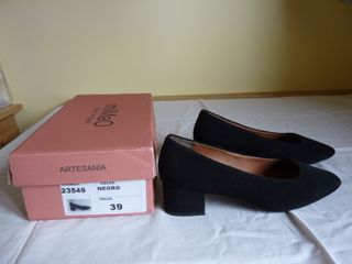 Zapatos de vestir, utilizados durante media hora  