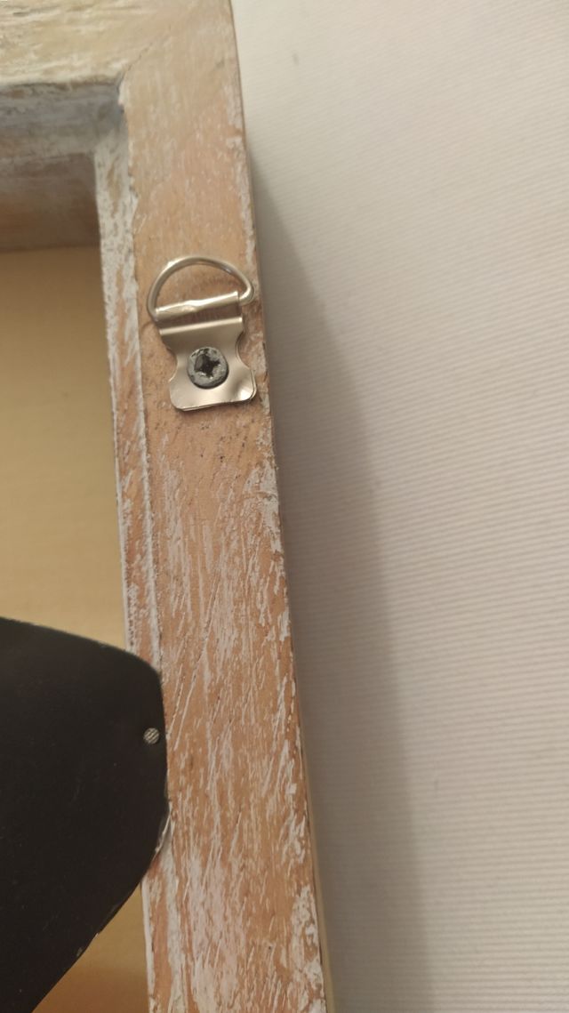 Decoración pared madera hoja metal