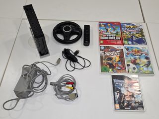 Lote Wii con accesorios y 5 juegos