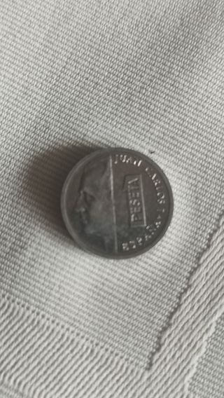 22 monedas de 1 pesetas