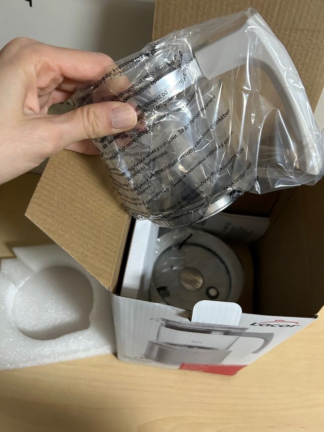 Espumador y calentador de leche o agua