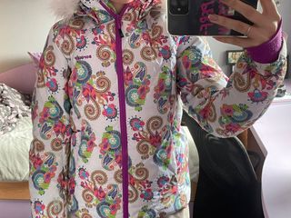 Conjunto cazadora y botas de nieve