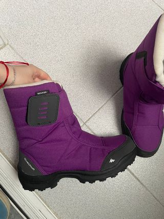 Conjunto cazadora y botas de nieve