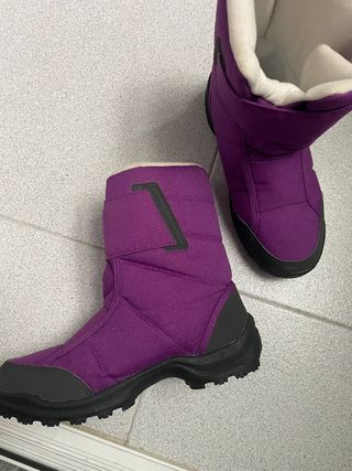 Conjunto cazadora y botas de nieve