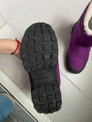 Conjunto cazadora y botas de nieve