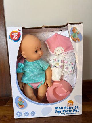 Muñeca con accesorios