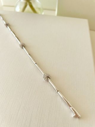 Pulsera oro blanco 750 mm. con orlas diamantes