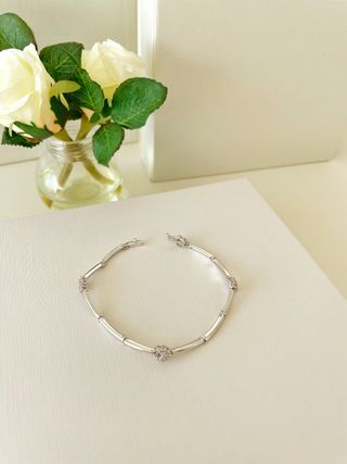 Pulsera oro blanco 750 mm. con orlas diamantes