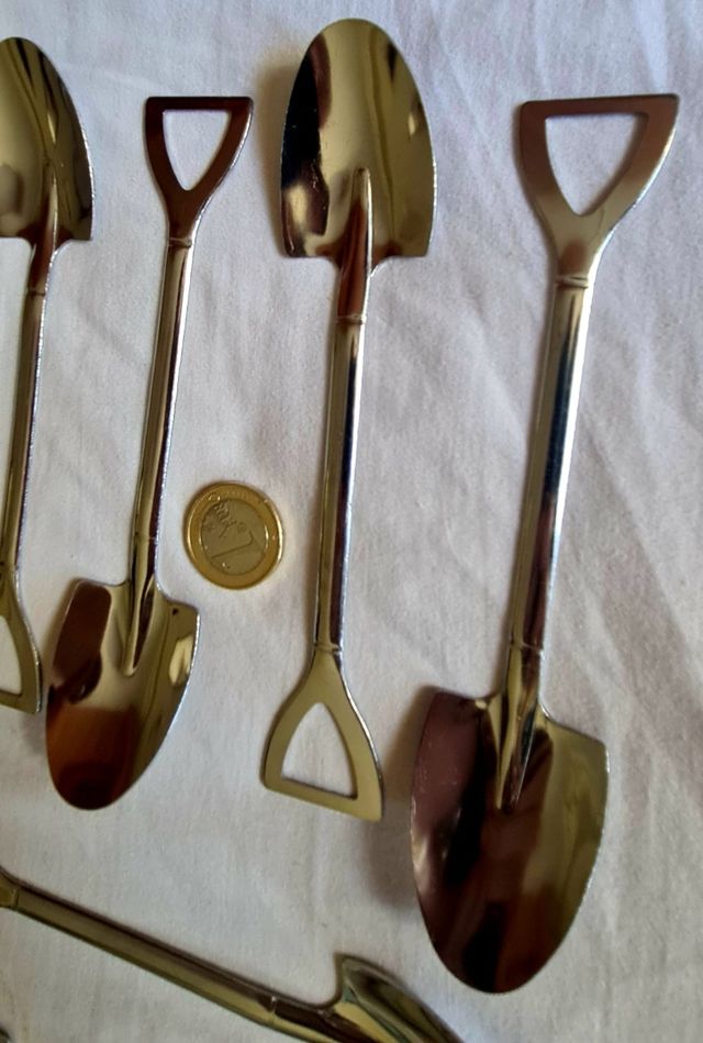 12 cucharas plateadas, pala