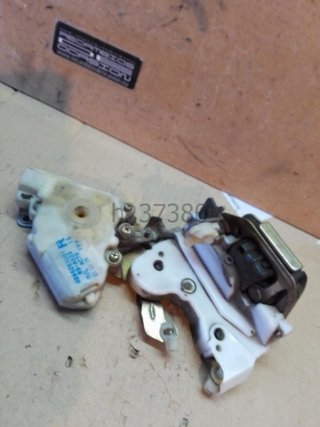 Cerradura puerta trasera derecha Nissan Mi h_37380